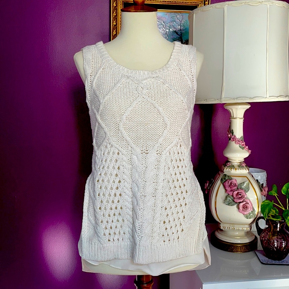 Sleeveless sweater knit top.